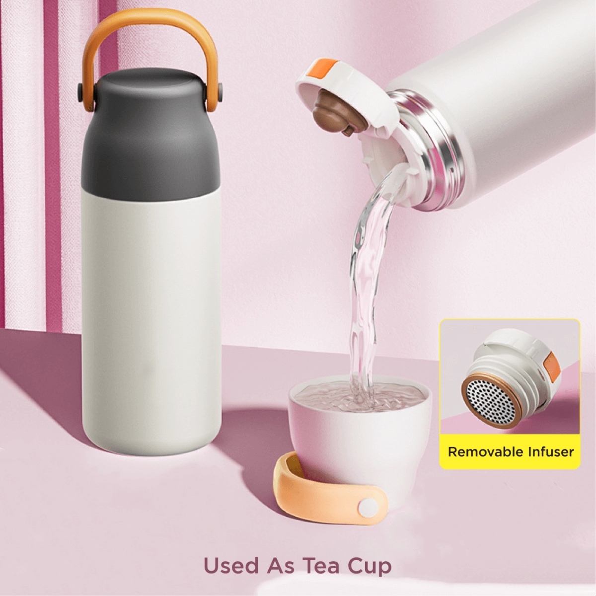 Fancy 500ml Vacum Flask With Cup & Handle pouring water into a cup with removable infuser.