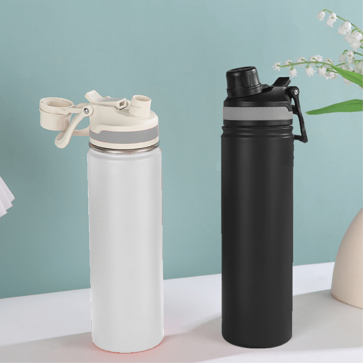 Kila 750ml Stainless Steel Vacuum Bottle in white and black, ideal for corporate gift and hydration needs.