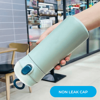 Charmy 500ml Stainless Steel Vacuum Flask with Handle in hand featuring non-leak cap design.