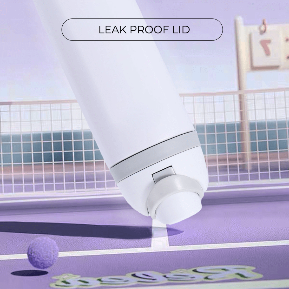 Ola 700ml Stainless Steel Vacuum Bottle with leak proof lid design on a tennis court.
