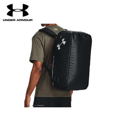 Under Armour Contain Duo Small Duffle in use as a backpack, showcasing water-repellent design and 40L capacity.