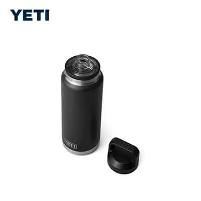 Yeti Rambler® 26 oz Bottle with Chug Cap in black, featuring shatter-resistant spout and TripleHaul™ handle.