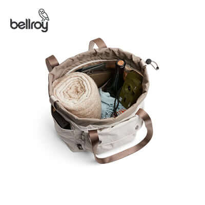 Inside view of the Bellroy Cinch Tote Bag showing a towel, bottle, and organized items, perfect for a corporate gift.