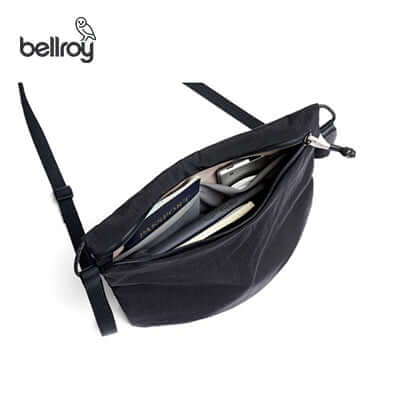 Bellroy Lite Sacoche Sling Bag featuring expandable storage, ideal for everyday use and travel, eco-friendly design.