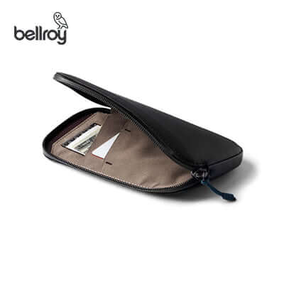 Bellroy All Conditions Phone Pocket Plus Leather with organized cards and cash in a sleek, zippered design.