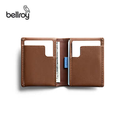 Open view of Bellroy Slim Sleeve Wallet in brown, showcasing card slots and a minimalist design for corporate gift options.