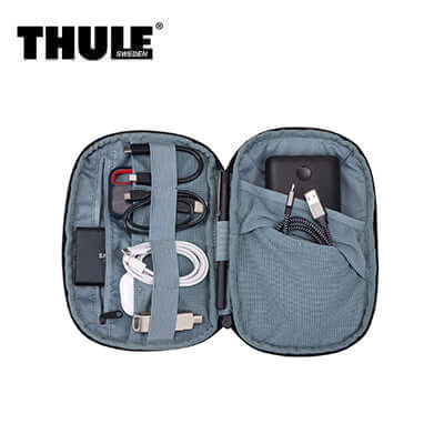 Thule Subterra 2 Powershuttle Medium Organizer with chargers and cables for organized travel.