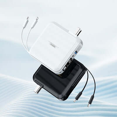 Remax RPP-276 Compact Power Bank 15000mAh in black and white with dual fast-charging cables.