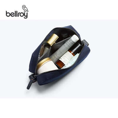 Inside view of the Bellroy Toiletry Kit Pouch featuring various toiletries, perfect for travel and organization.