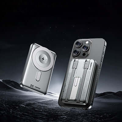 Remax CX-2 Magnetic Wireless Charging Powerbank with Cable and Stand next to a smartphone on a dark background.