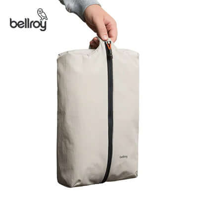 Bellroy Lite Packing Caddy 10L being held, versatile packing organizer perfect for travel and corporate gifts.