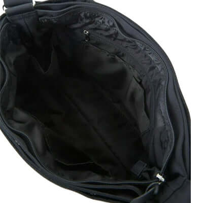 Interior view of the Anello To Go Shoulder Bag showing multiple compartments and spacious design.