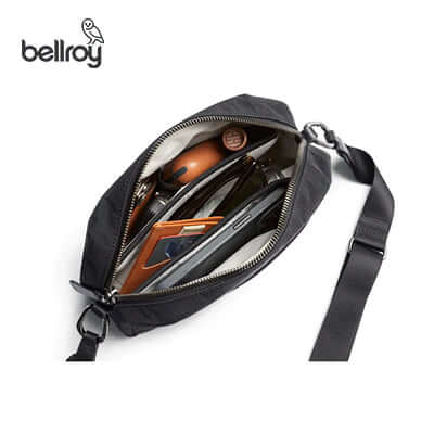 Interior view of the Bellroy Tokyo Crossbody Bag showing organization of items, ideal as a corporate gift.