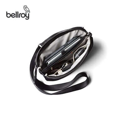 Interior view of the Bellroy Tokyo Side Sling Bag showing organized essentials, ideal as a Corporate Gift.