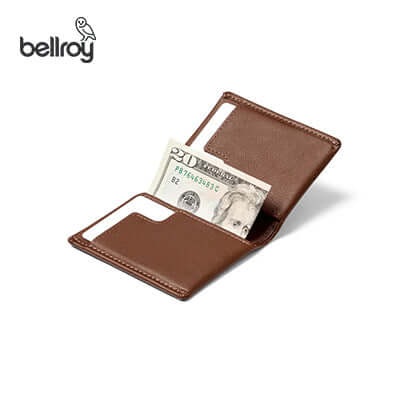 Bellroy Slim Sleeve Wallet open with cash inside, ideal corporate gift for stylish practicality.
