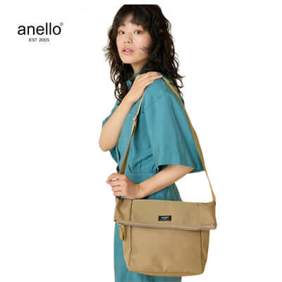 Anello Parcel Mini Shoulder Bag in use, showcasing its stylish design and compact functionality for daily wear.