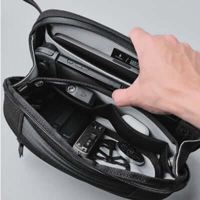 Interior view of the Alpaka Waist Pack 600D showcasing organized compartments for essentials.