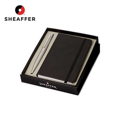Sheaffer Strobe Silver Ballpoint Pen with Chrome Trims and Small Notebook Gift Set in elegant packaging.