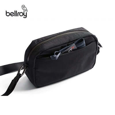 Bellroy Tokyo Crossbody Bag in black with a front pocket and adjustable strap, ideal as a corporate gift.