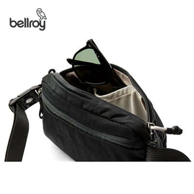 Bellroy Lite Belt Bag showcasing sunglasses and organized internal pocket, ideal as a Corporate Gift.