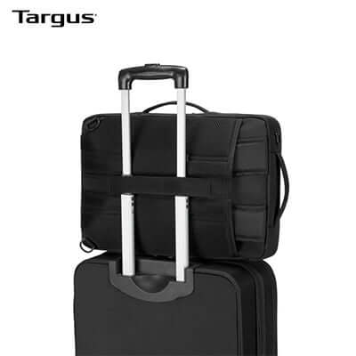 Targus 15.6" Urban Convertible Backpack attached to a wheeled suitcase, showcasing its travel versatility.