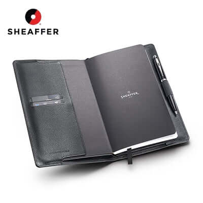 Sheaffer Gift Set 100 Ballpoint Pen with Leather Notebook Jacket open, showcasing the stylish design and logo.