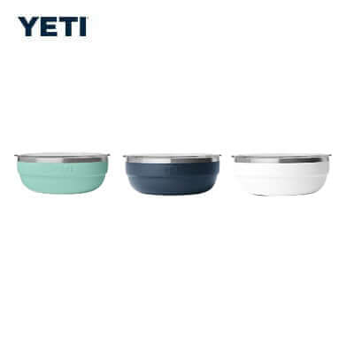 Yeti Rambler® 3.6 QT Insulated Low Bowl in three colors: mint, navy, and white.