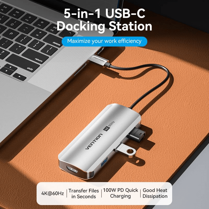 Vention 5-in-1 USB-C Docking Station with Ethernet on a desk, offering 4K@60Hz output and quick file transfers.