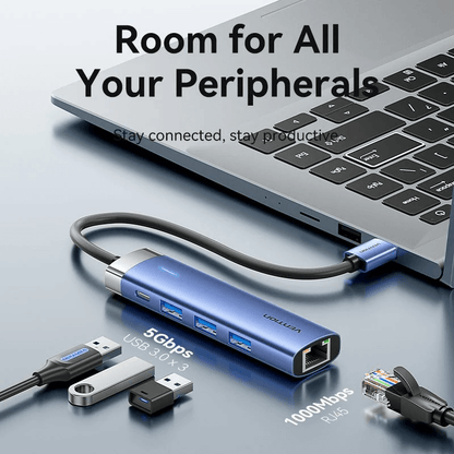 Vention 5-in-1 USB 3.0 Docking Station connected to a laptop with multiple peripherals.