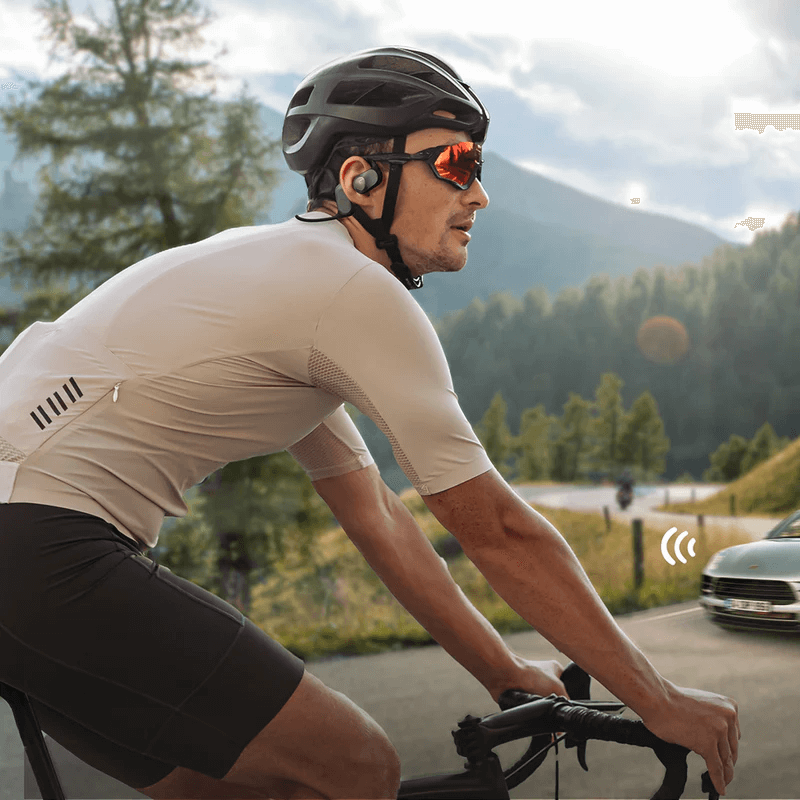 SOUNDPEATS RunFree Open-ear Sport Headphones being used by a cyclist for active lifestyles.