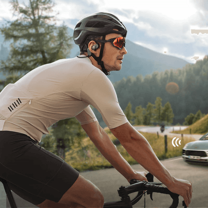 SOUNDPEATS RunFree Open-ear Sport Headphones being used by a cyclist for active lifestyles.