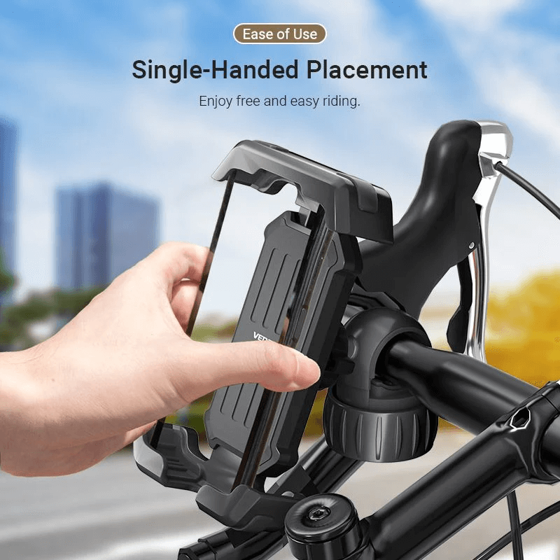 Vention 360° Bike Phone Mount for single-handed placement on a bicycle handlebar.