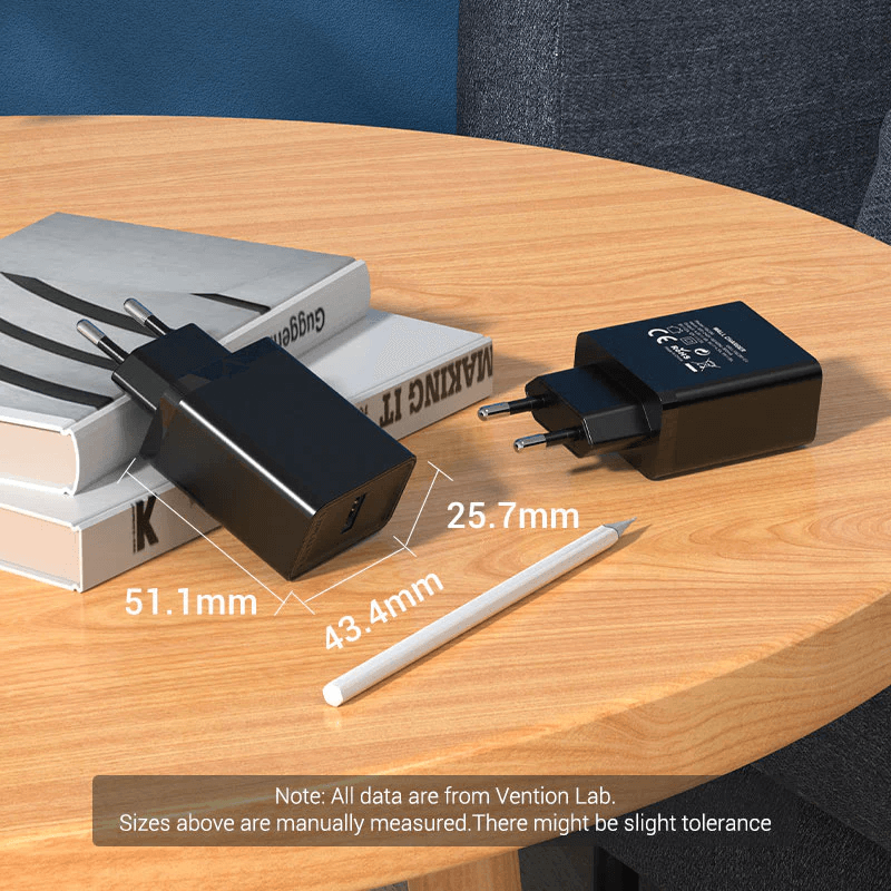 Vention 1-Port USB Wall Charger 22.5W dimensions on a table showing size comparisons with a pencil.