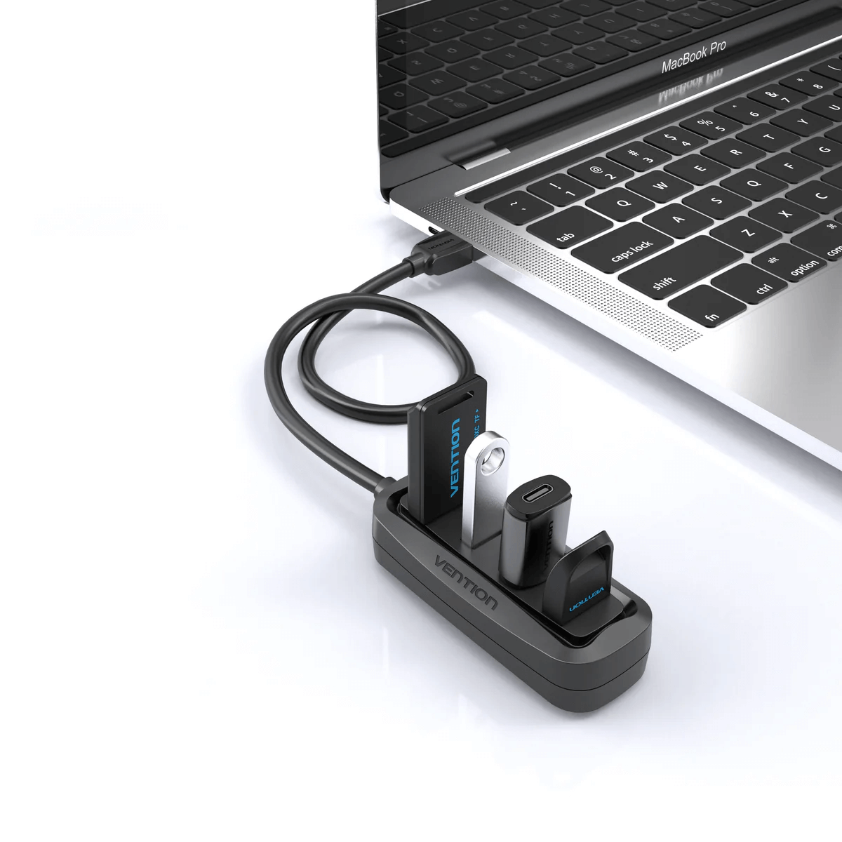 Vention 4-in-1 USB 2.0 Hub connected to a laptop, perfect for corporate gift solutions.