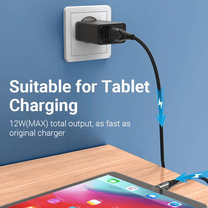 Vention 1-Port USB Wall Charger 12W charging a tablet, efficient and compact wall charger for devices.