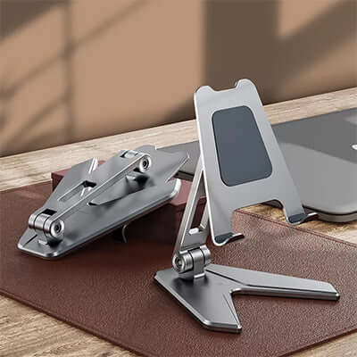 Blackdot A-Hold Premium Universal Adjustable Phone & Tablet Portable Aluminum Holder in a stylish setting.