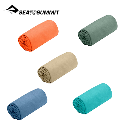 Sea To Summit Airlite Towel Large in various colors folded neatly, ideal for outdoor adventures.