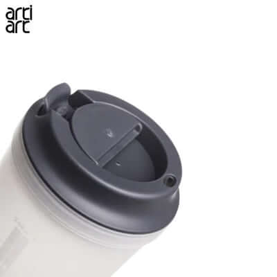 Close-up of the Artiart Crystal Suction Mug lid showcasing its sleek design and smart grip technology.