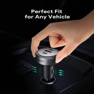 Aukey CC-P3 Pathfinder Mix 3 100W Fast Charging Car Charger installed in vehicle socket.