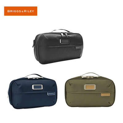 Briggs & Riley Baseline Expandable Essentials Kit in black, navy, and olive colors, perfect for organized travel.