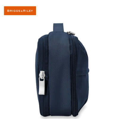 Briggs & Riley Baseline Expandable Essentials Kit side view showing zip-around expansion and durable design.
