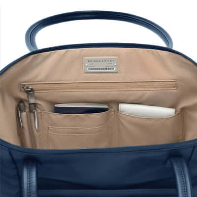 Interior view of the Briggs & Riley Rhapsody Expandable Shopping Tote showing pockets and organizational features.