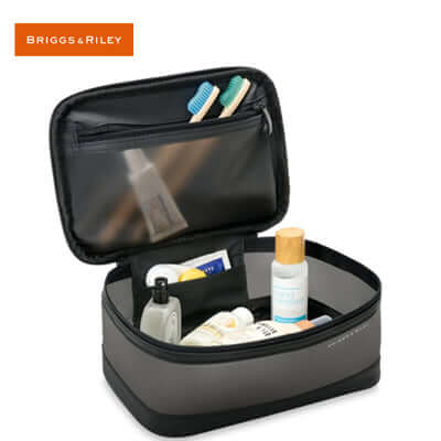 Briggs & Riley Translucent Essentials Case with toiletries and organizers, perfect for travel and as a Corporate Gift.
