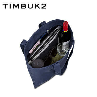 Timbuk2 Canvas Shop Tote Bag featuring internal pockets, ideal for versatile usage and organization.
