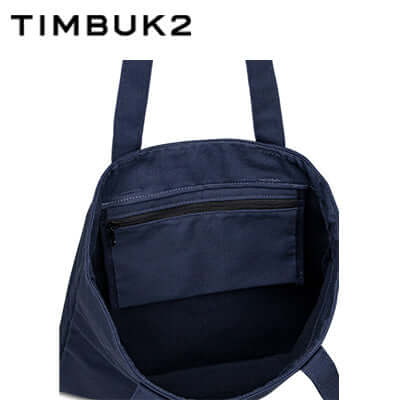 Interior view of the Timbuk2 Canvas Shop Tote Bag showing internal pocket and key keeper.