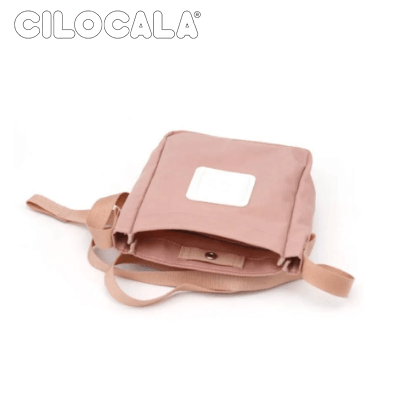 Cilocala Regular Nove Shoulder Bag in soft pink, showing the interior compartment, perfect as a corporate gift.