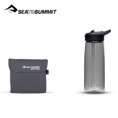 Sea To Summit Drylite Towel X-Small folded with water bottle, perfect corporate gift for travelers.