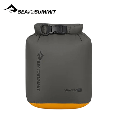 Sea To Summit Evac Dry Bag 3L in grey and orange, showcasing waterproof design and compact storage features.
