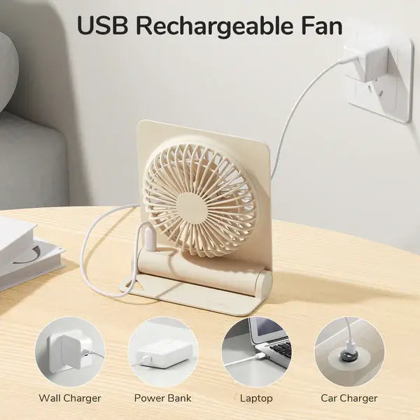 JisuLife Table Fan Life3 USB rechargeable fan connected to wall charger on a desk.