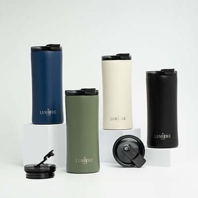Lumiere Lavish Ceramic Insulated Mug 16oz in various colors with screw-in lid, ideal for elegant corporate gifts.